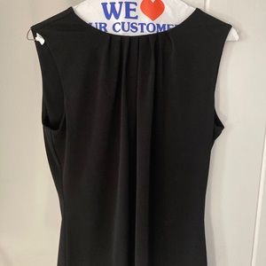 Tags on, Calvin Klein blouse